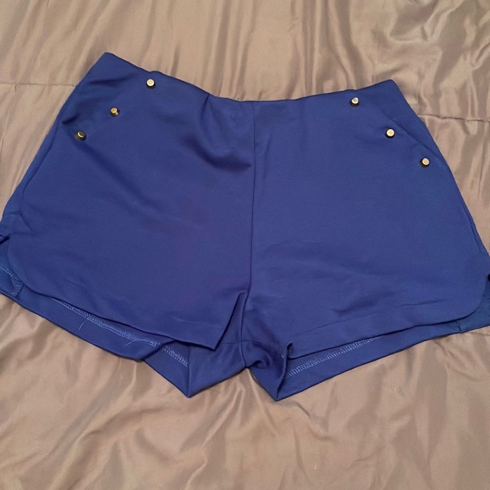 Blue shorts with gold studs